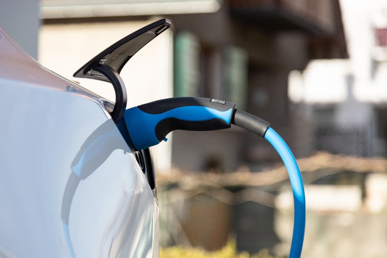 An electric vehicle charging at a ChargeZippy station